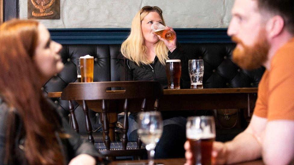 Drinkers in the Scotsman Lounge, Edinburgh