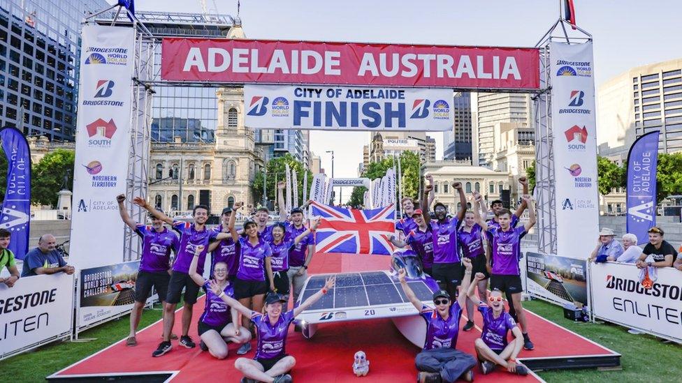 Durham University solar car team at finish line