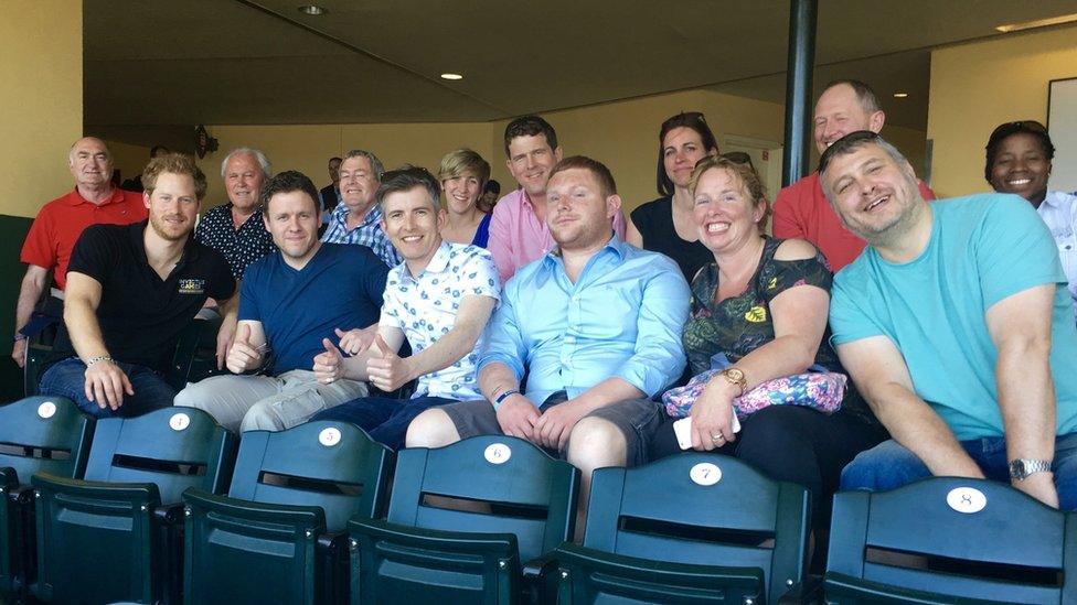 Gemma Moore (back row, third from right) and Prince Harry with the Invictus choir