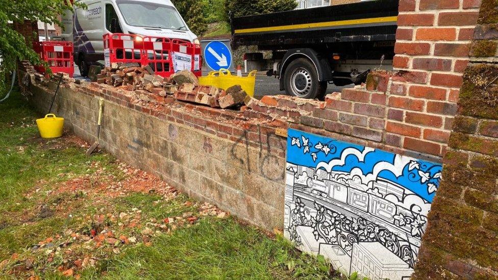 Wall after lorry crash