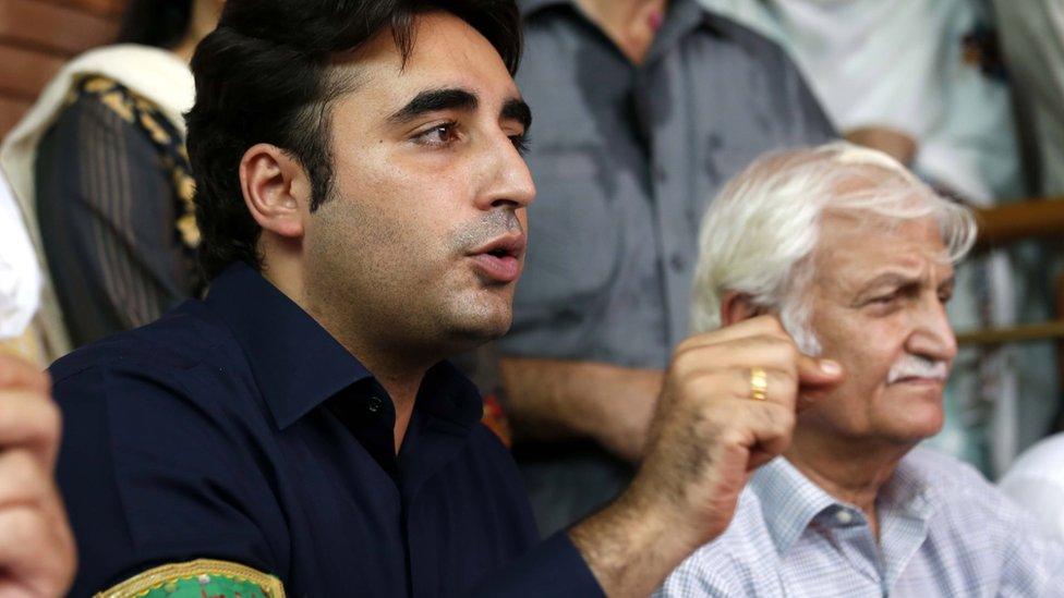 Bilawal Bhutto speaks to journalists as he campaigns ahead of the 2018 election