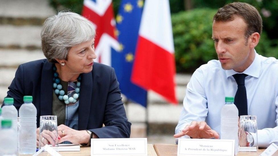 Emmanuel Macron and Theresa May