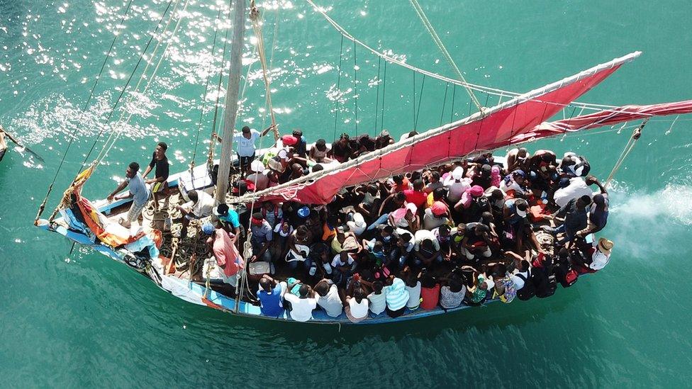 This aerial image shows a view of a ship with passengers from Port-de-Paix seen on October 8, 2018, as they travel to Ile de La Tortue