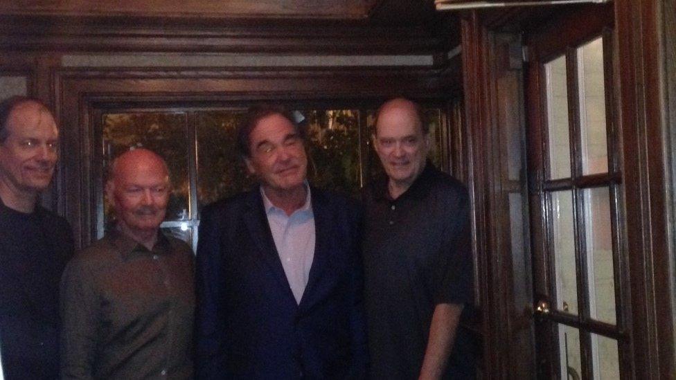 Whistleblower Thomas Drake, along with Jim Bamford, Oliver Stone and Bill Binney, posing for a photo