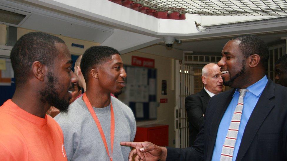 David Lammy MP (right) chats with prisoners Jason Ageyekum-Sah (far left) and Barfah Joof (centre)