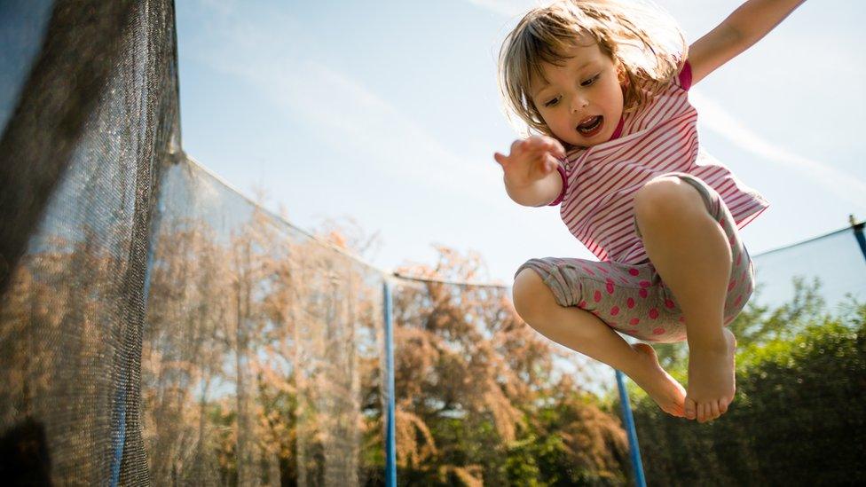 A girl on a trampoline