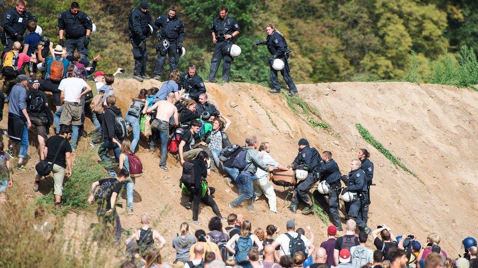 Police prevent protesters from getting to the forest