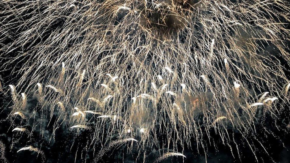 Fireworks explode