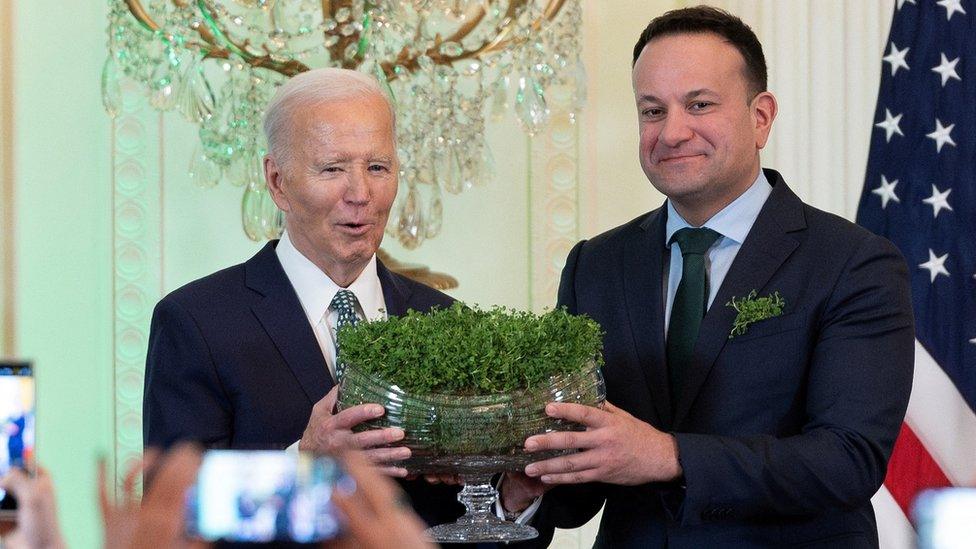 Joe Biden and Leo Varadkar exchange a bowl of shamrock