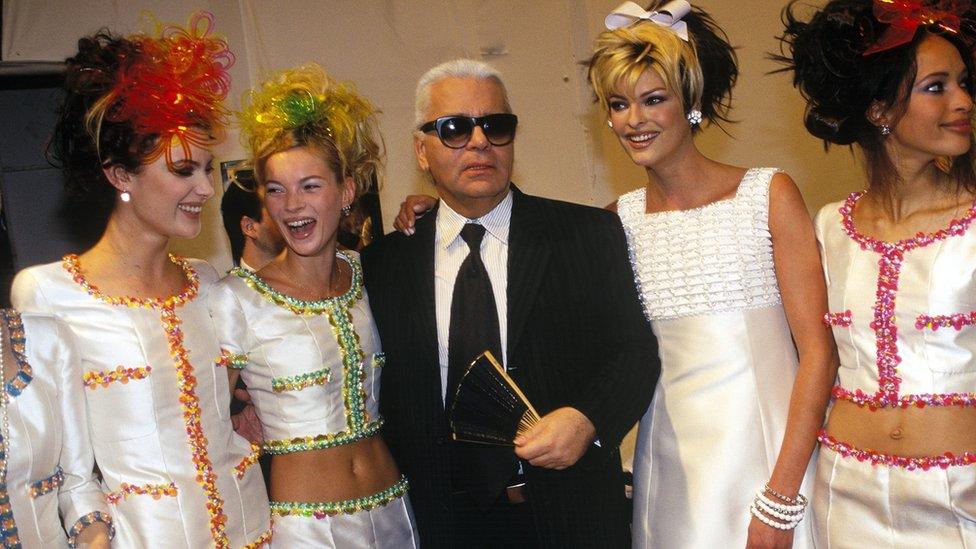 Karl Lagerfeld with models