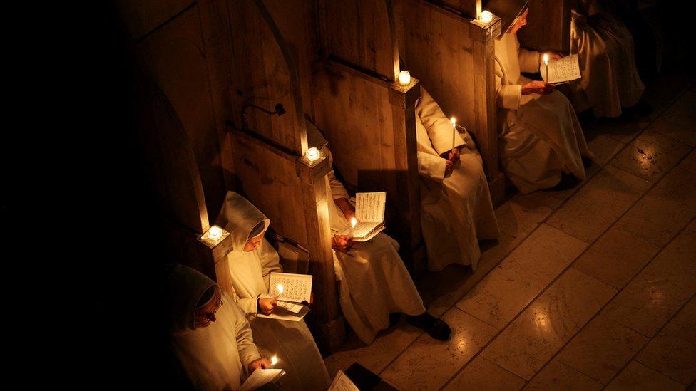 Catholic nuns from the Sisters of Bethlehem hold candles as they take part in Mass at the Beit Jamal Monastery near Beit Shemesh, Israel