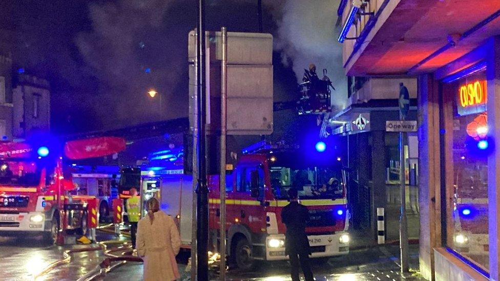 Fire and smoke coming from the offices above Forbidden Planet