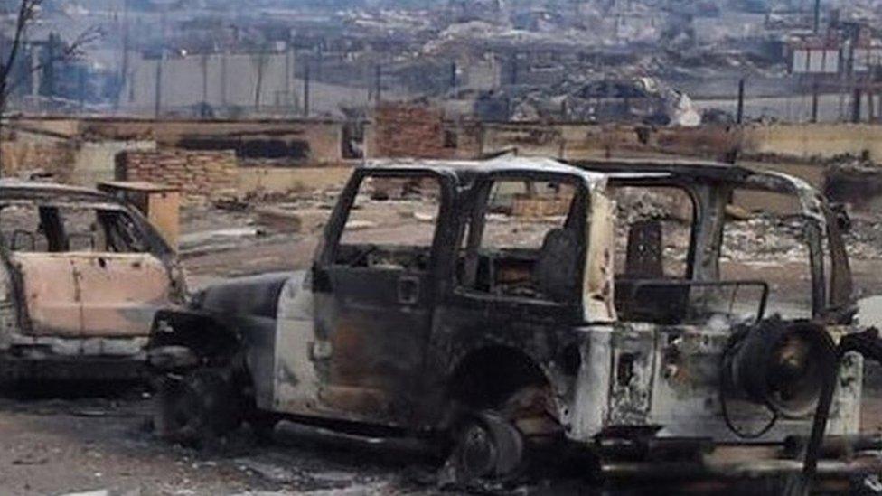 Picture of burnt-out cars in Fort McMurray, 5 May 2016