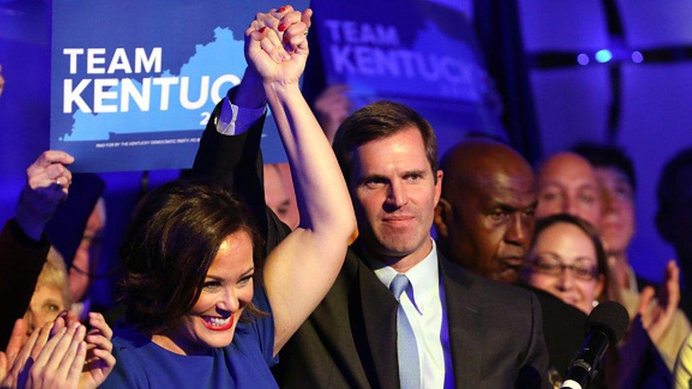 Democrat Andy Beshear celebrates with supporters after voting results showed he won the Kentucky governor's race