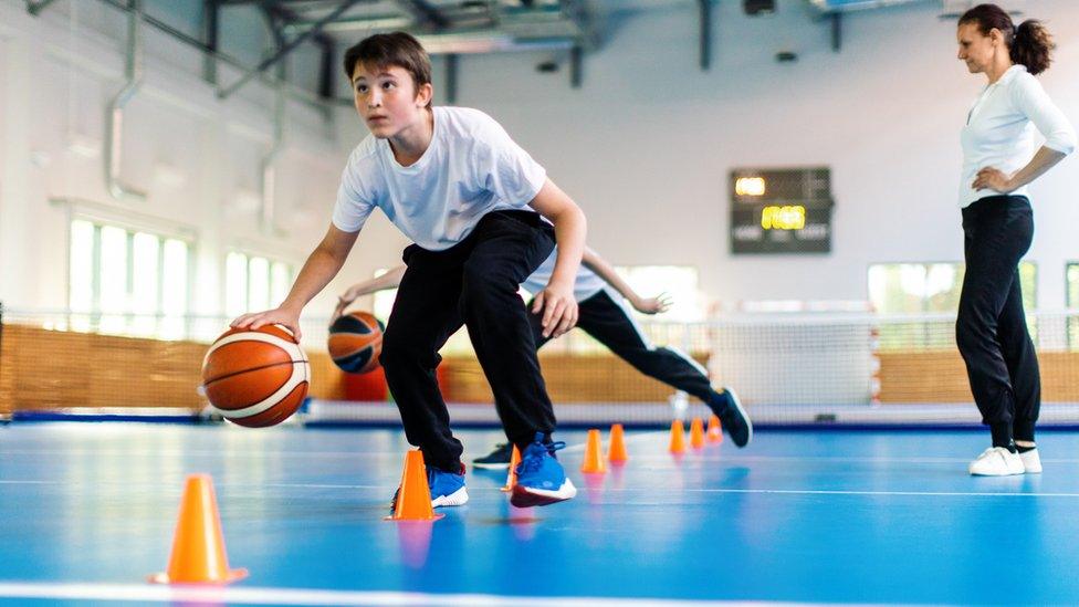 Boy playing basketball