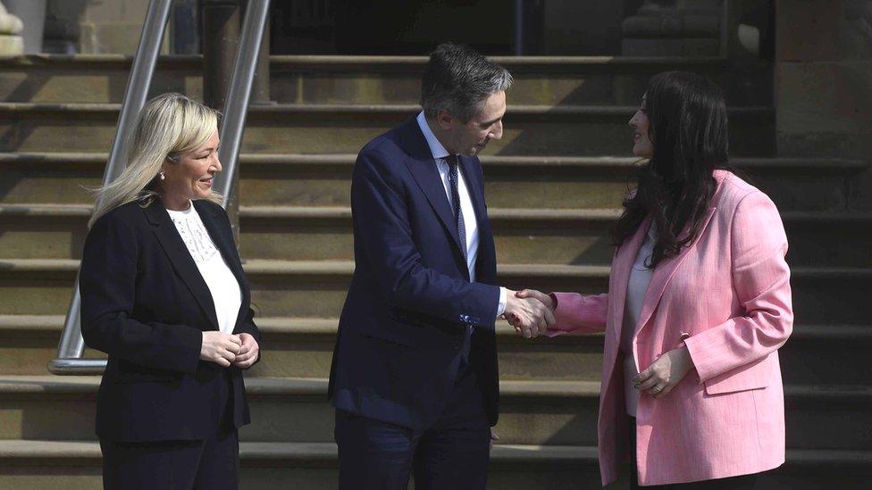 Simon Harris shakes Emma Little-Pengelly's hand