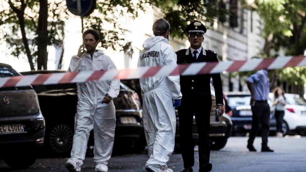 Police investigate a crime scene where Mario Cerciello Rega was killed