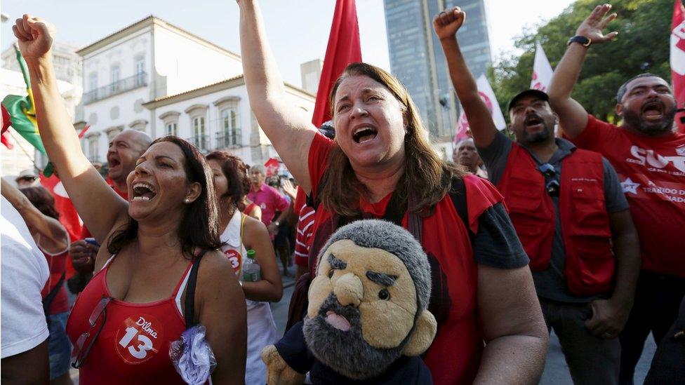 Demonstrators take part in a protest in support of Brazilian President Dilma Rousseff"s appointment of former president Luiz Inacio Lula da Silva as her chief of staff, in Rio de Janeiro on 18 March