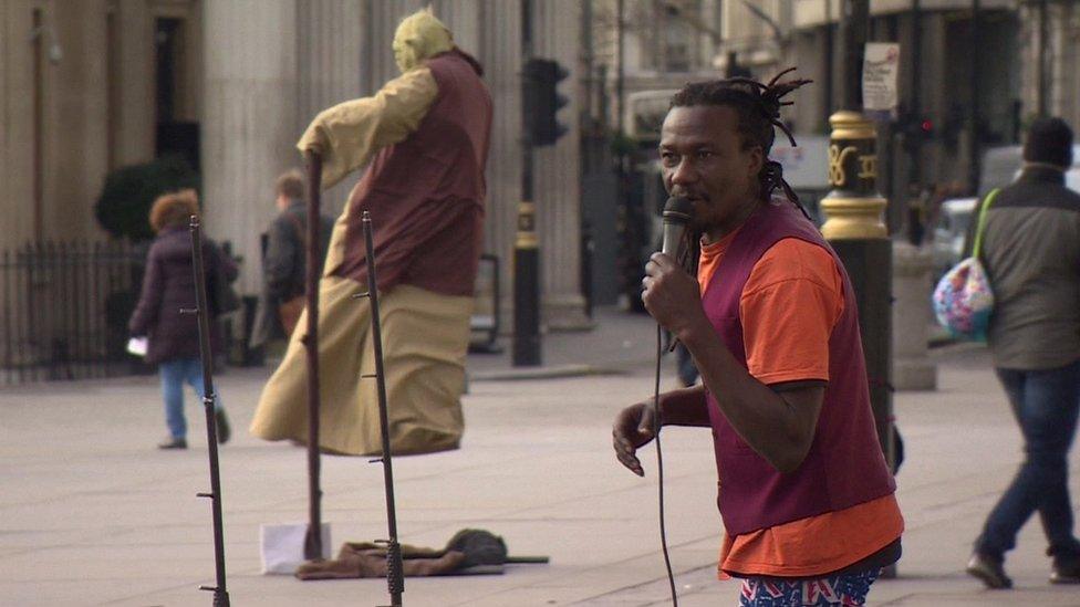 Street performer and "Yoda"