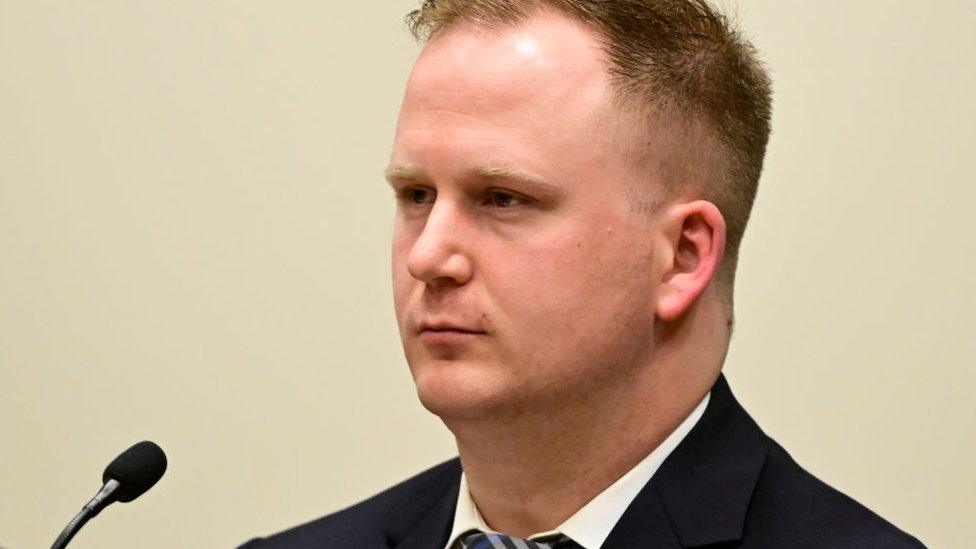 Aurora Police officer Nathan Woodyard during an arraignment in the Adams County district court at the Adams County Justice Center