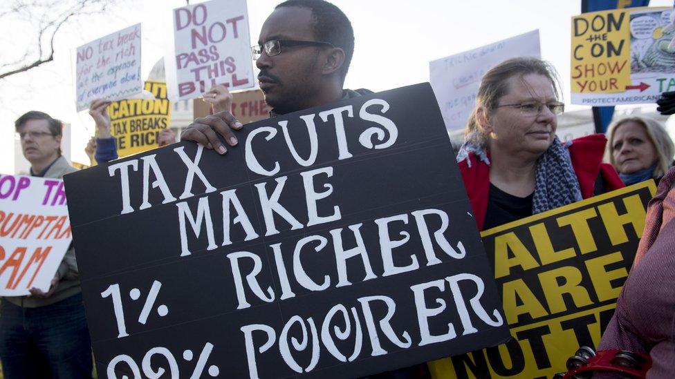 Demonstrators against the Republican tax reform bill hold a 'Peoples Filibuster to Stop Tax Cuts for Billionaires,' protest rally outside the US Capitol on Capitol Hill in Washington, DC, November 30, 2017.