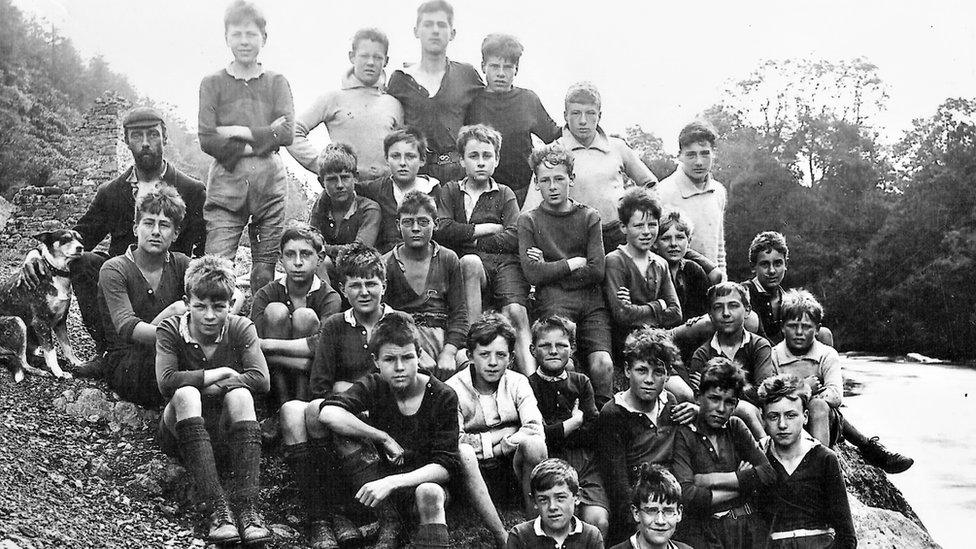 1924 photo of Birmingham schoolboys, Henri Guerra and dog at Bryntail camp