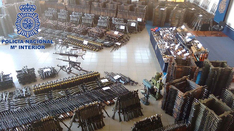 A picture showing the large stockpile of guns seized by Policia Nacional