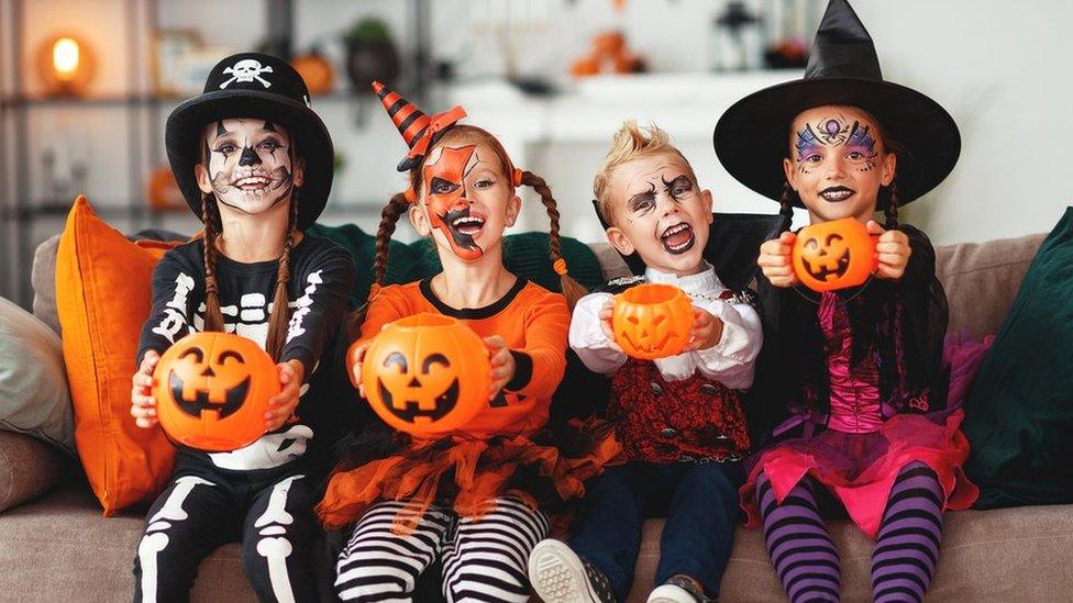 kids in halloween outfits