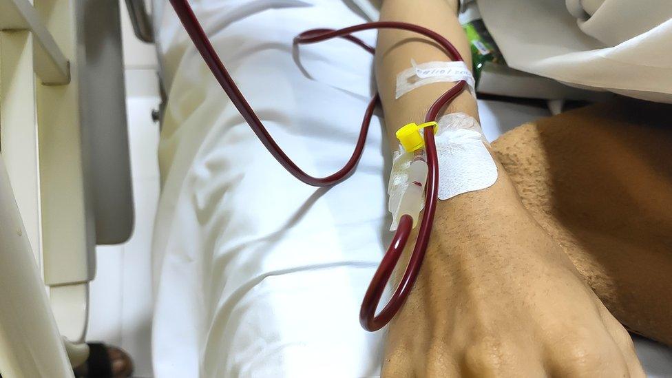 A patient receives a blood transfusion