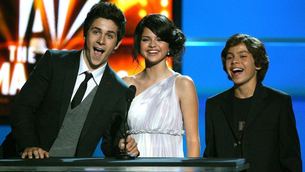 Actors David Henrie, Selena Gomez and Jake T. Austin onstage in 2008