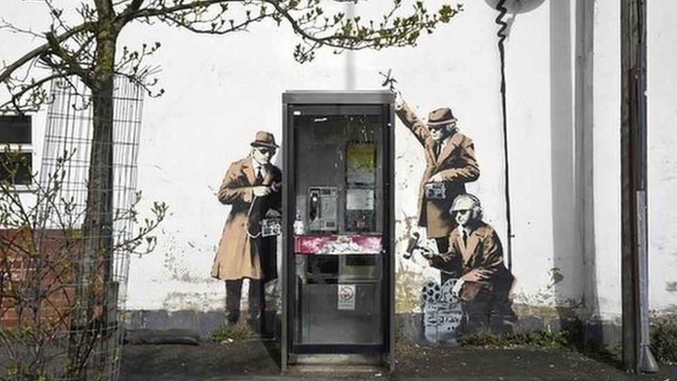 Banksy's Spy Booth artwork in Cheltenham