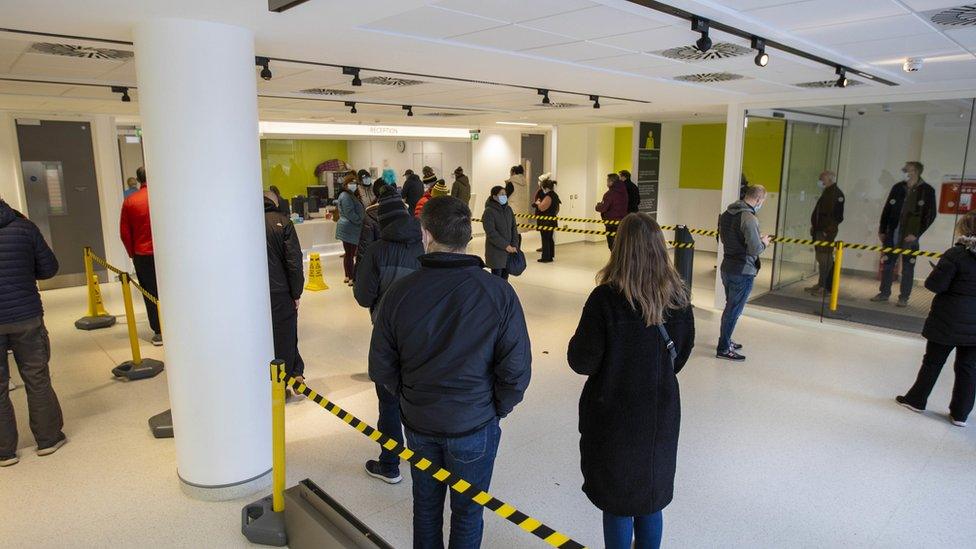 People queuing at Dundonald Hospital vaccination centre