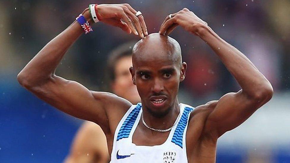 Mo Farah crosses the finish line