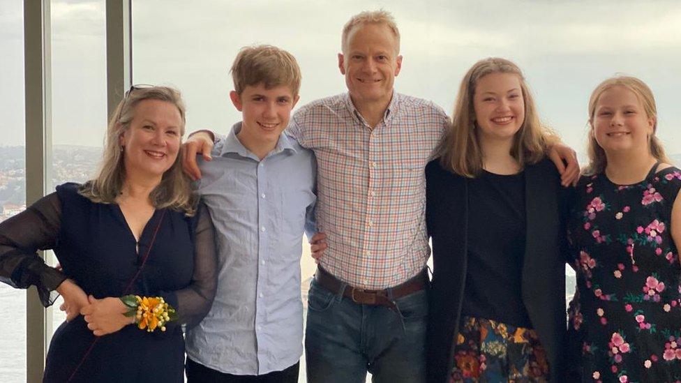 Richard Scolyer (centre) and his family