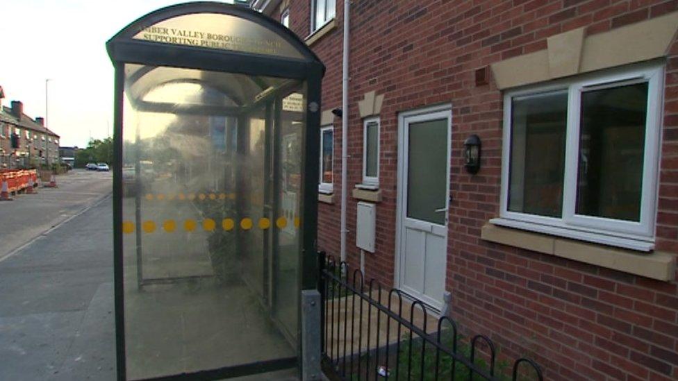 Bus shelter blocking house in Langley Mill