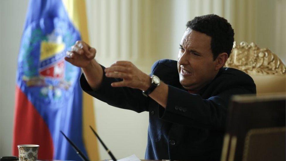 Actor Andres Parra impersonates Venezuela's former President Hugo Chavez during the filming of "El Comandante" in Bogota, Colombia.