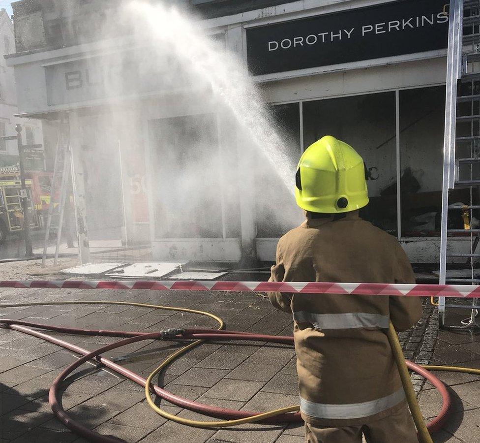 Firefighters at Dorothy Perkins in Dumfries