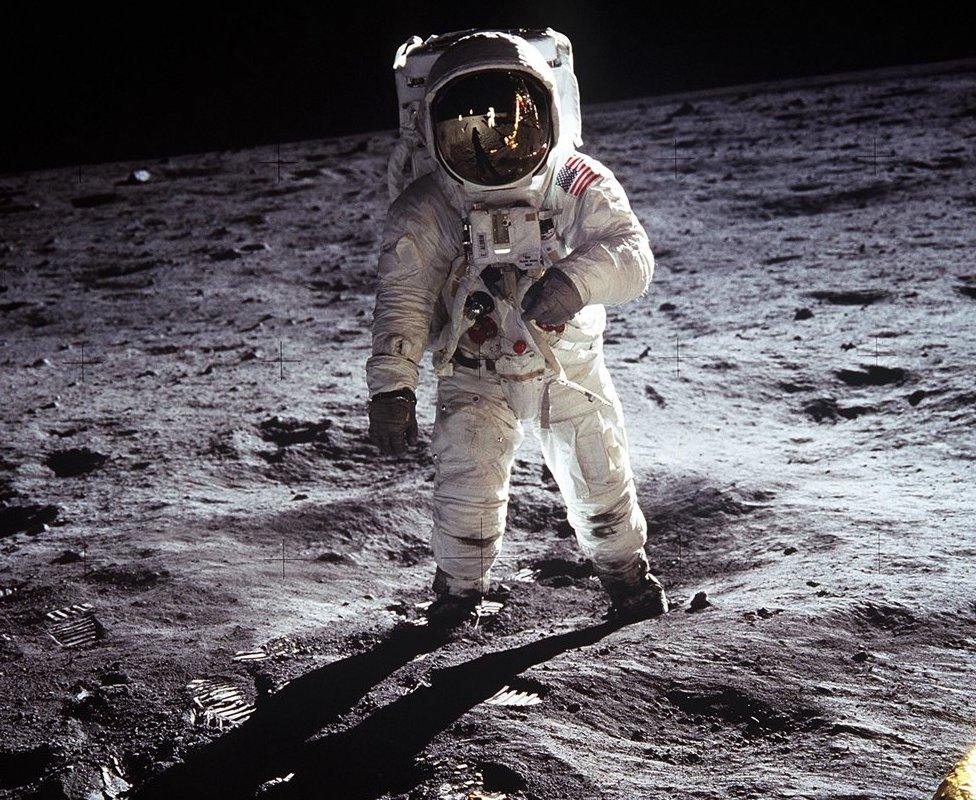 Buzz Aldrin walks on the moon