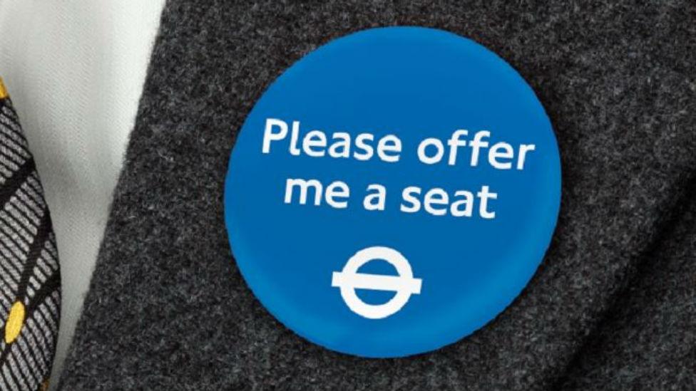 TfL's "Please offer me a seat badge"