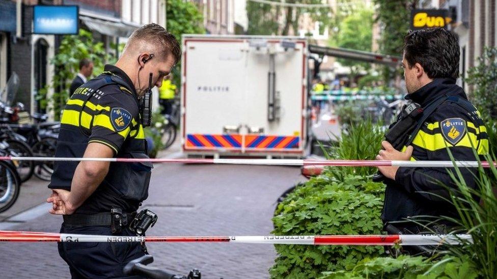 Police at the site of a shooting in Amsterdam, the Netherlands