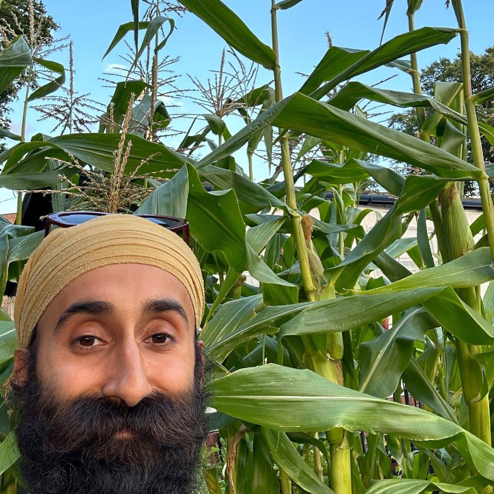 Shuranjeet Singh with the school's corn