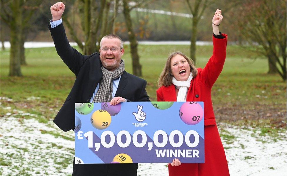 Ellie Land and Karl Ward celebrating their lottery win