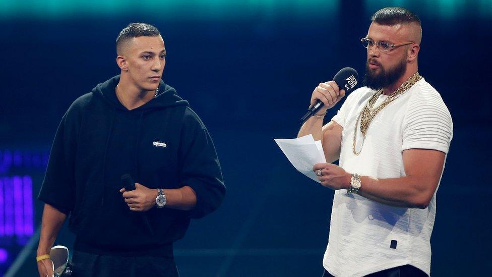 German rappers Kollegah and Farid Bang receiving the "Hip-Hop/Urban national" award during the 2018 Echo Music Awards on 12 April