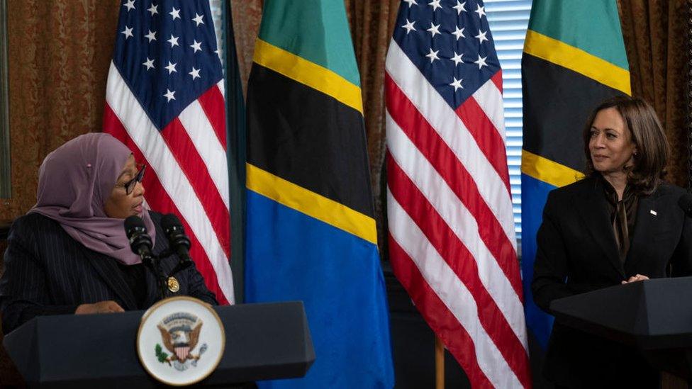 US Vice President Kamala Harris listens to Tanzania's President Samia Suluhu Hassan make a statement to the press before a meeting in the Eisenhower Executive Office Building April 15, 2022