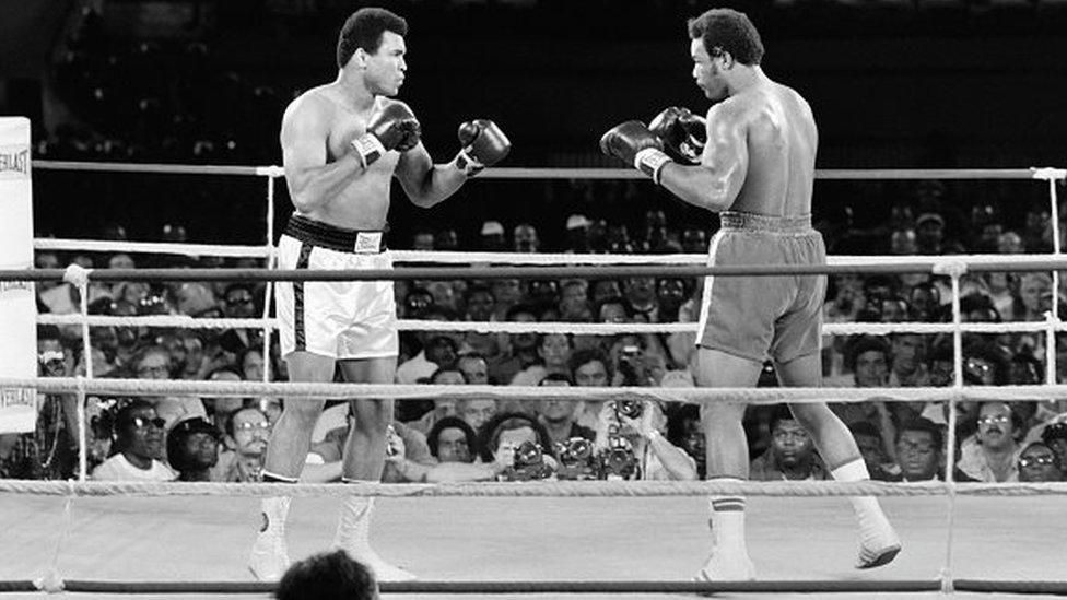 Muhammad Ali (L) (born Cassius Clay) and George Foreman in Kinshasa