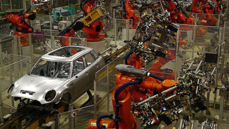 a robotic assembly line at the BMW Mini car production plant in Oxford