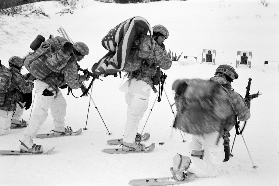 Sergeant Joshua Vermote 25, Student (centre with flag)