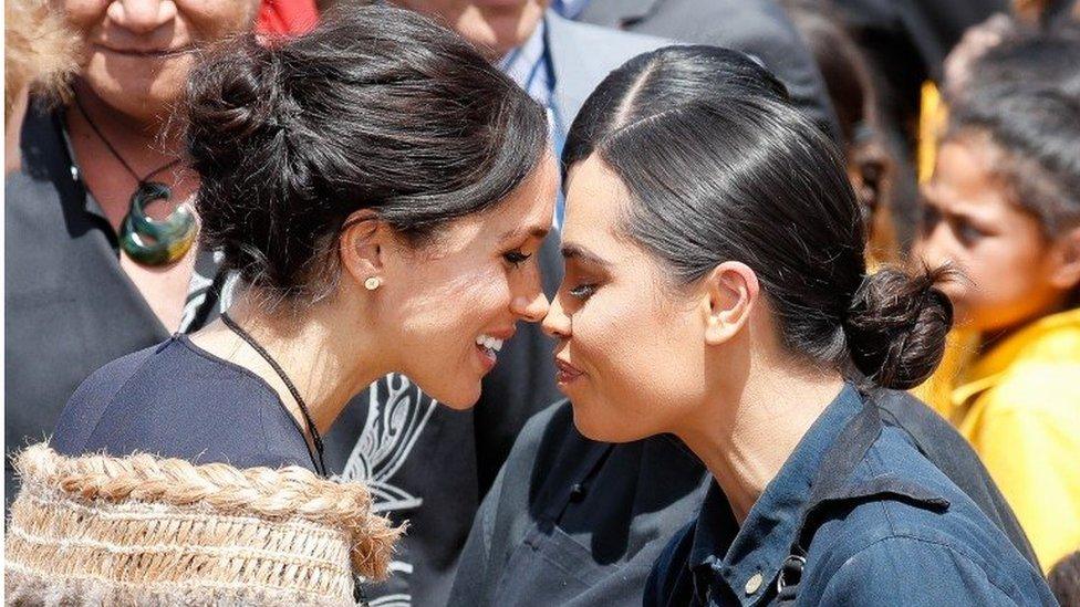 Meghan, Duchess of Sussex greets locals in a traditional "hongi"