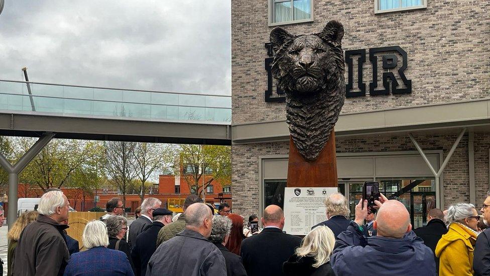 People at the monument's unveiling