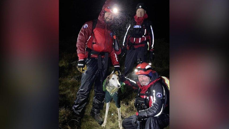 Members of the Kinder Mountain Rescue Team with Kai